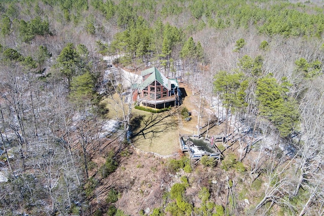 bird's eye view featuring a view of trees