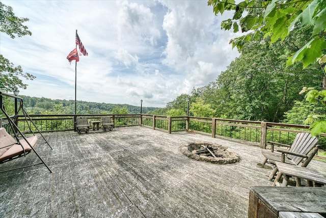 101 Dakota Ln, Spencer, TN 38585 - wooden terrace featuring a fire pit
