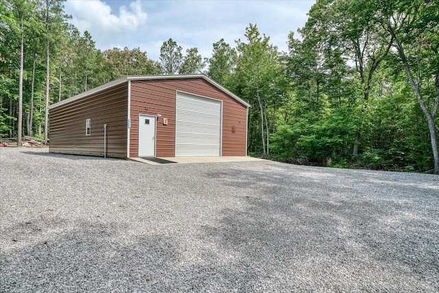 101 Dakota Ln, Spencer, TN 38585 - detached garage with gravel driveway