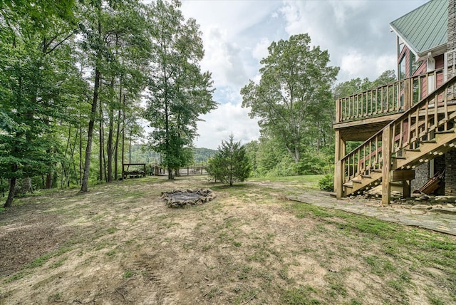 101 Dakota Ln, Spencer, TN 38585 - view of yard featuring stairway and a deck