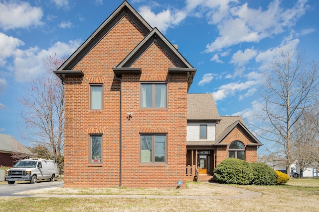 traditional home with brick siding