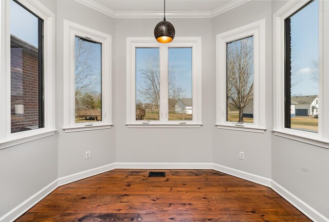 unfurnished sunroom with visible vents and a wealth of natural light