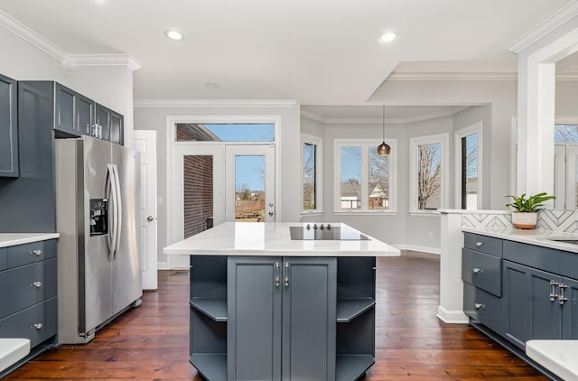 kitchen featuring open shelves, light countertops, black electric cooktop, and stainless steel fridge with ice dispenser