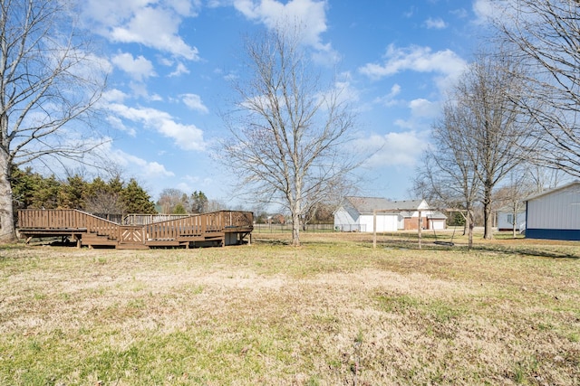 view of yard featuring a wooden deck