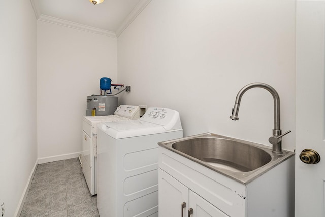 clothes washing area with cabinet space, ornamental molding, water heater, separate washer and dryer, and a sink