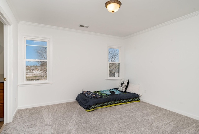 bedroom featuring carpet, multiple windows, and crown molding