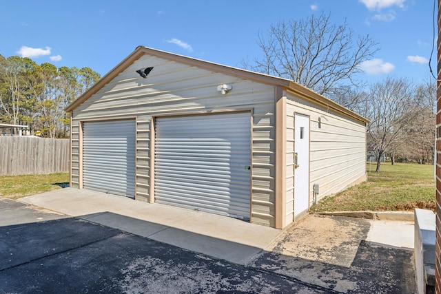 detached garage with fence