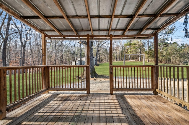 wooden terrace with a yard