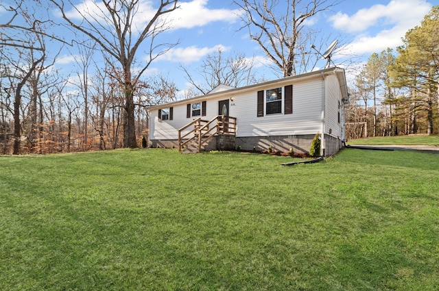 view of front of property with a front lawn