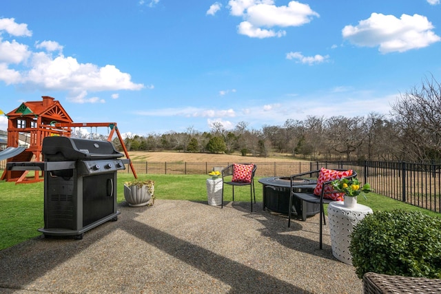 exterior space featuring a yard, a patio area, and a fenced backyard