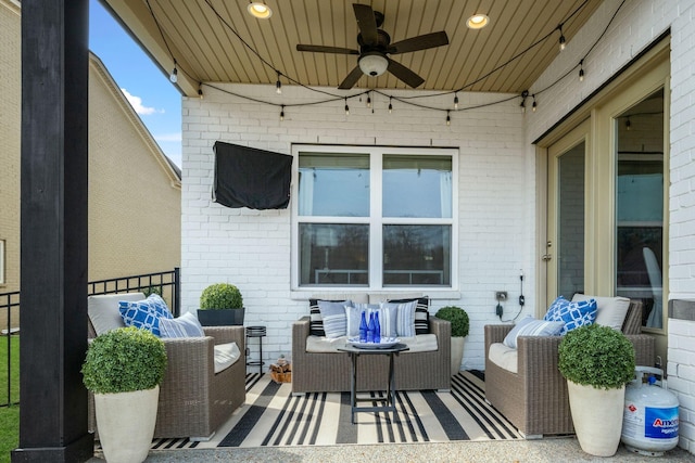 view of patio featuring a ceiling fan and an outdoor hangout area