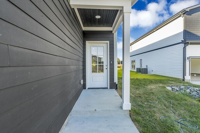 doorway to property with a yard