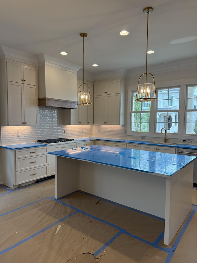 8007 Southvale Blvd, Franklin, TN 37064 - kitchen with a chandelier, decorative backsplash, white cabinets, a center island, and stainless steel dishwasher