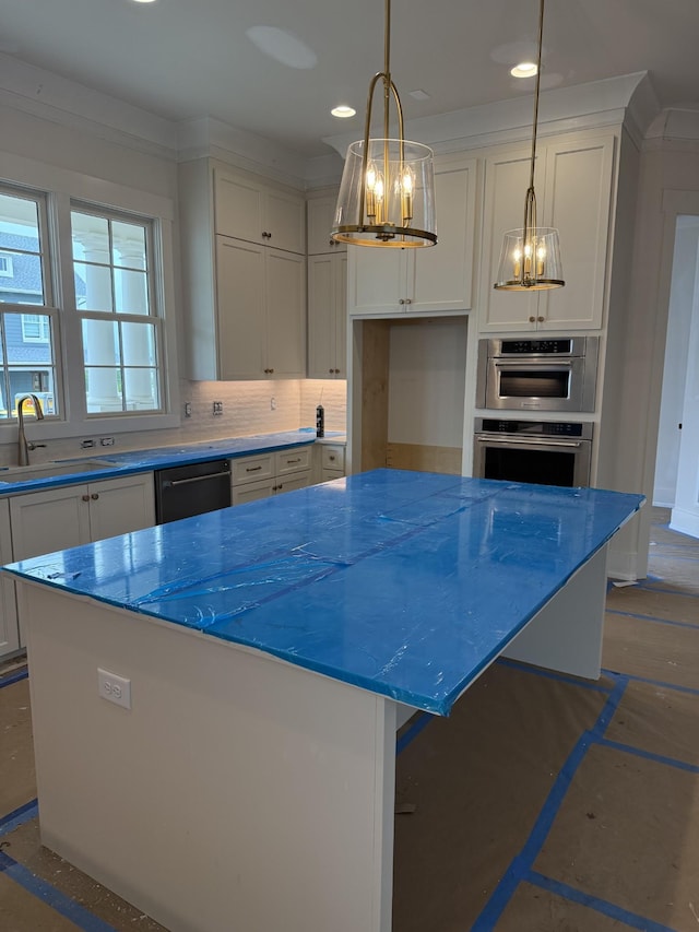8007 Southvale Blvd, Franklin, TN 37064 - kitchen with a sink, black dishwasher, white cabinets, a center island, and a chandelier