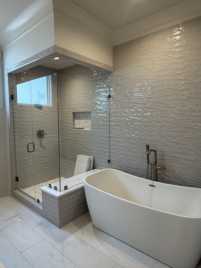 8007 Southvale Blvd, Franklin, TN 37064 - full bathroom with marble look tiles, a soaking tub, and a stall shower