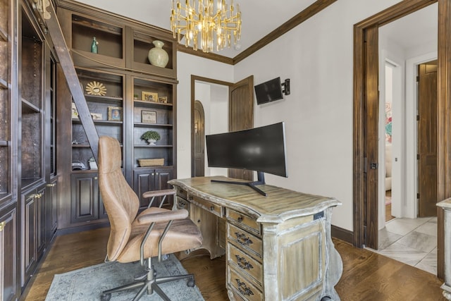 office area with a chandelier, dark wood finished floors, and crown molding