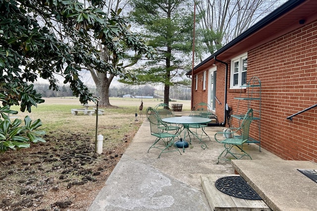 view of patio with outdoor dining area