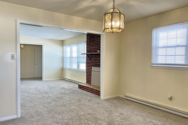 spare room featuring light carpet, a baseboard radiator, a fireplace, and baseboards