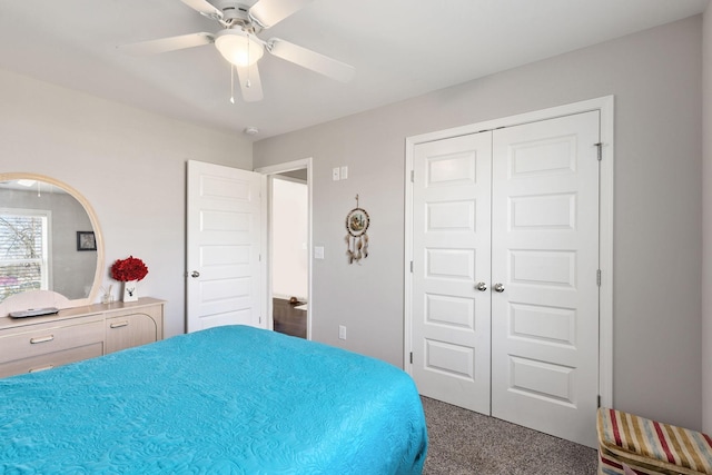 bedroom with carpet floors, a closet, and a ceiling fan