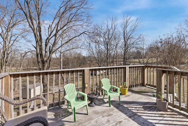 deck featuring a storage shed