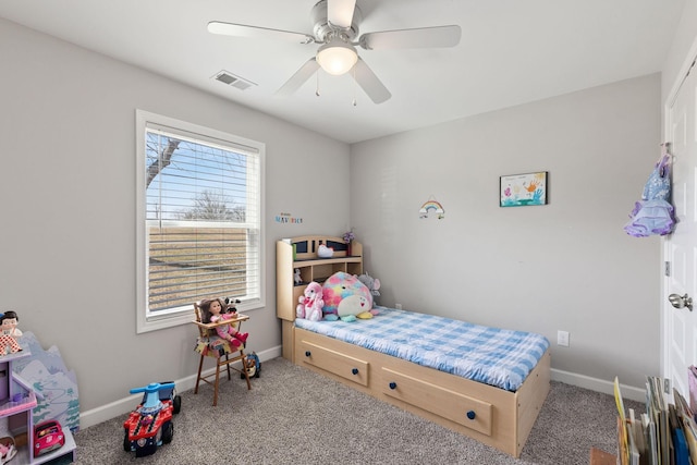 bedroom with carpet, baseboards, visible vents, and a ceiling fan