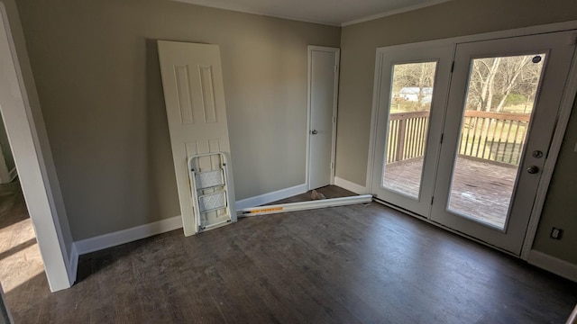 entryway with dark wood-type flooring and baseboards