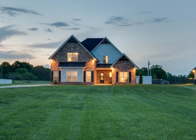 7009 Virgil Ct, Murfreesboro, TN 37129 - craftsman house featuring brick siding, stone siding, fence, and a front yard