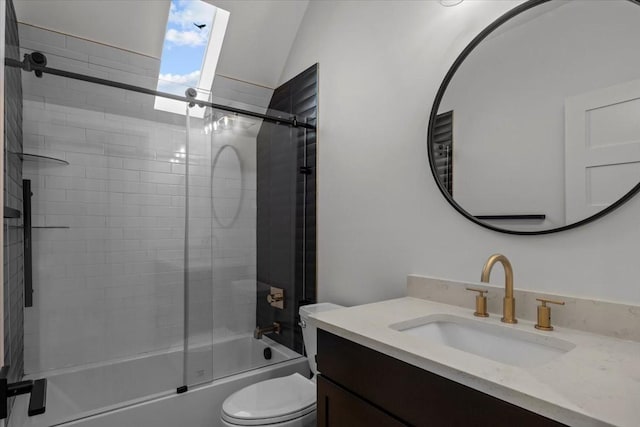 bathroom featuring toilet, shower / bath combination with glass door, lofted ceiling, and vanity