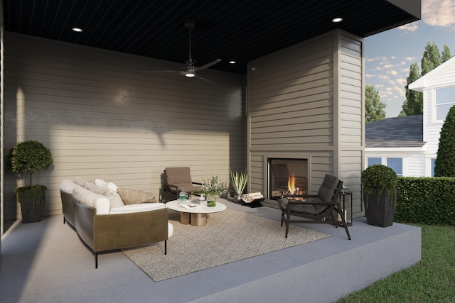 view of patio featuring a ceiling fan and an outdoor living space with a fireplace