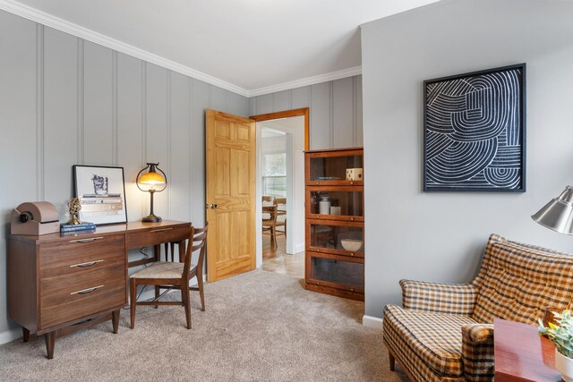 office space with ornamental molding and light carpet