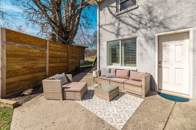 view of patio / terrace with fence and outdoor lounge area