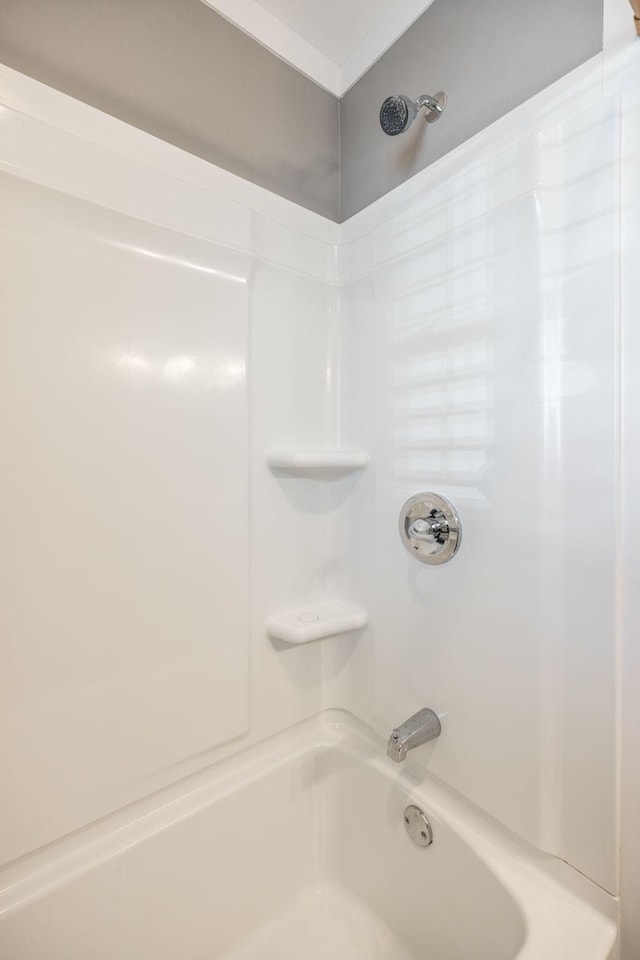 full bath featuring shower / tub combination