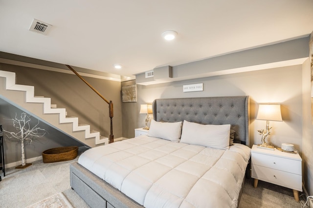 carpeted bedroom with recessed lighting, visible vents, and baseboards