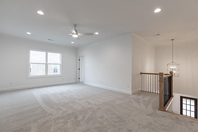 unfurnished room featuring light carpet, baseboards, crown molding, and recessed lighting