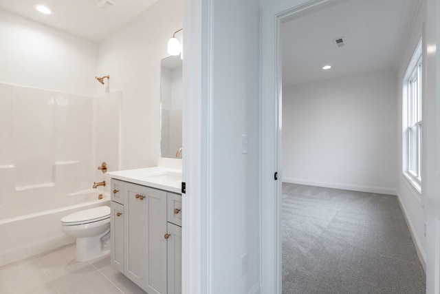 bathroom with visible vents, toilet, tile patterned flooring, vanity, and shower / washtub combination