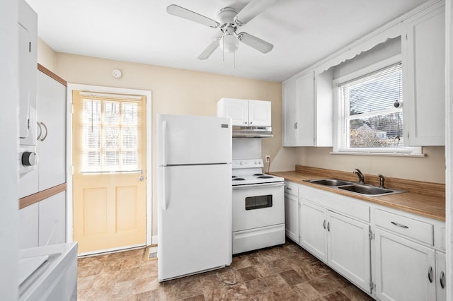 kitchen with light countertops, white cabinets, a sink, white appliances, and under cabinet range hood