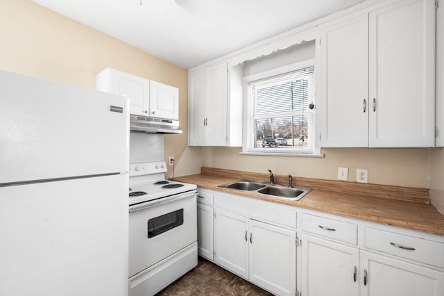 kitchen with light countertops, white cabinets, a sink, white appliances, and under cabinet range hood