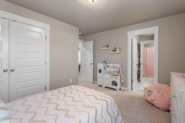 bedroom featuring light colored carpet