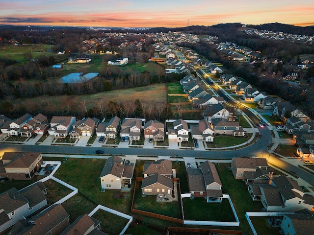 aerial view at dusk with a residential view