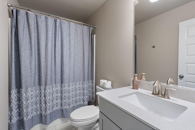 full bath featuring toilet and vanity