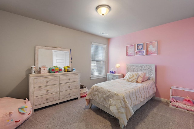 bedroom featuring carpet flooring, visible vents, and baseboards