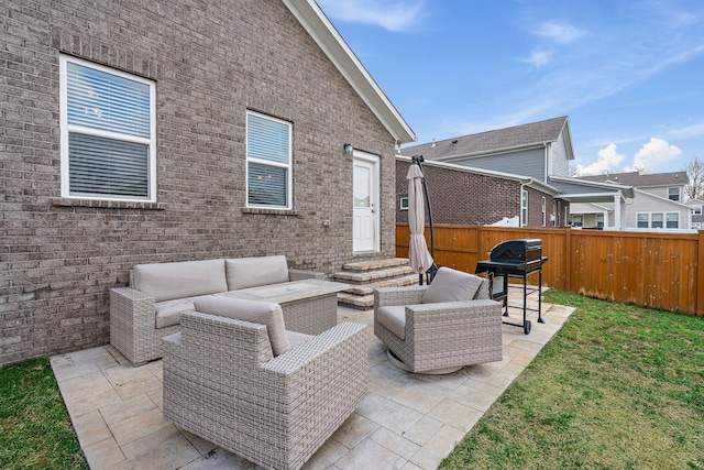 view of patio / terrace with an outdoor hangout area and a fenced backyard