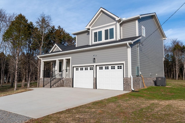 view of property exterior featuring central air condition unit, driveway, an attached garage, and a lawn