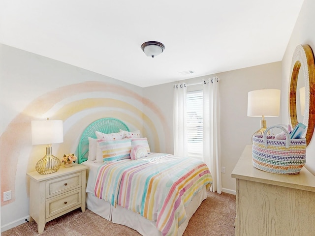 bedroom featuring light carpet, visible vents, and baseboards