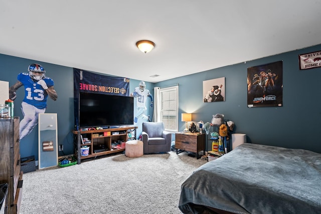 bedroom with carpet floors and visible vents