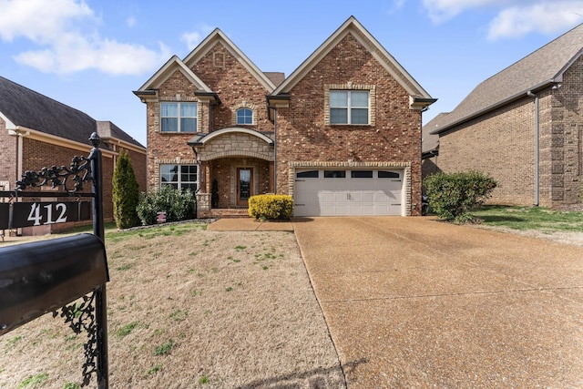 view of front of property with a garage, concrete driveway, and brick siding