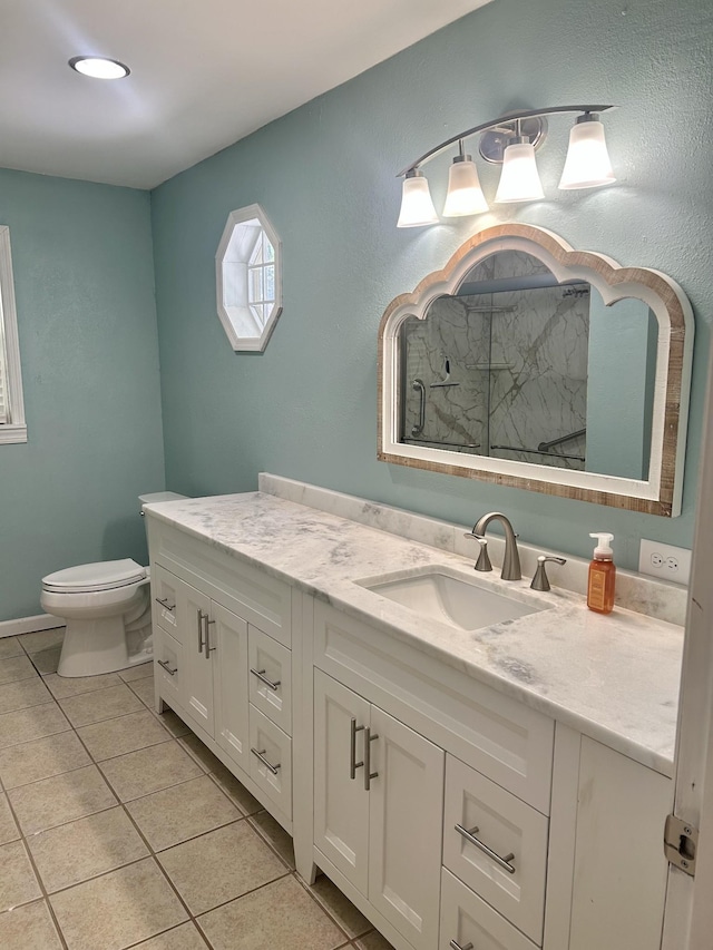 403 Bryan Blvd, Manchester, TN 37355 - full bathroom featuring toilet, tile patterned flooring, vanity, and a marble finish shower