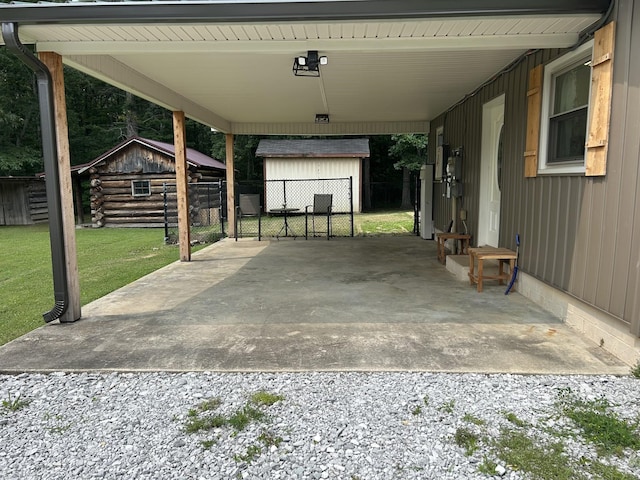 403 Bryan Blvd, Manchester, TN 37355 - view of patio / terrace featuring an attached carport and driveway