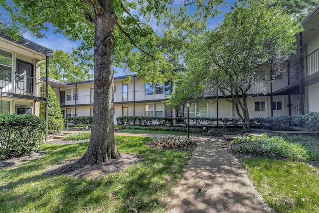 view of community featuring a lawn