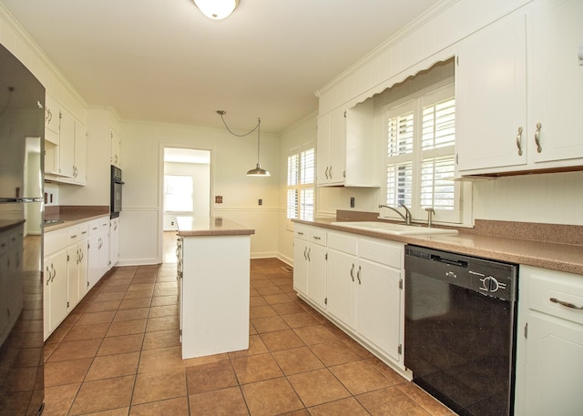 kitchen with a center island, tile patterned flooring, crown molding, black appliances, and white cabinetry